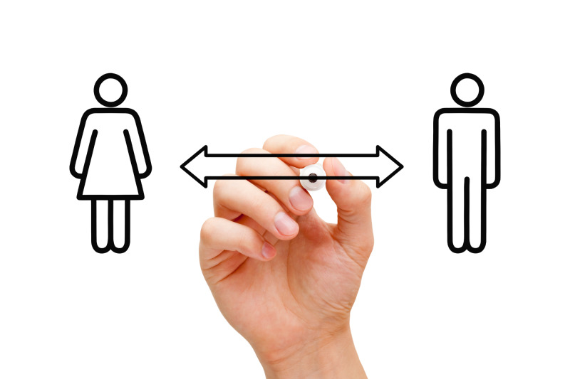Restraining order concept; a hand drawing arrows of separation between two spouses